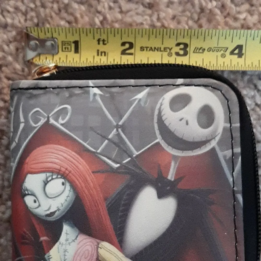 NWOT  Nightmare Before Christmas short wallet with zippered closure.